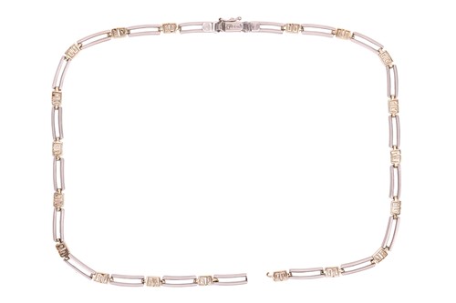 Lot 60 - A bi-colour metal necklace (broken in one...