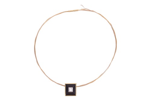 Lot 151 - A diamond-set torque necklace, featuring a...
