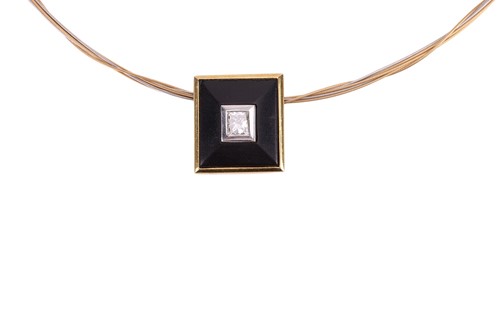 Lot 151 - A diamond-set torque necklace, featuring a...