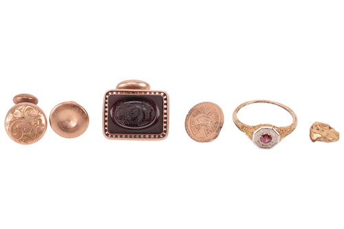 Lot 111 - A red paste set ring, with filigree mount in...