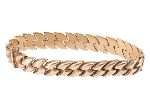 Lot 150 - A fancy link bracelet, comprising a series of...