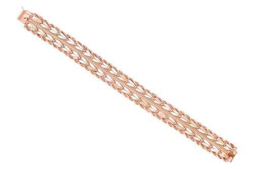 Lot 99 - A fancy-link bracelet, featuring two rows of...