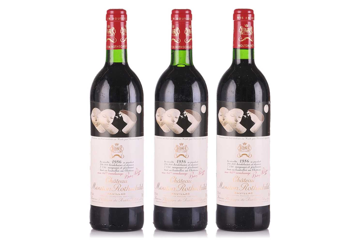 Lot Three bottles of 1986 Chateau Mouton...