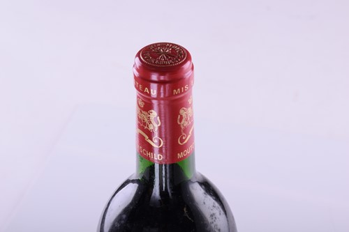 Lot Three bottles of 1986 Chateau Mouton...