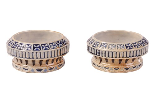 Lot 129 - A pair of Martin Brothers stoneware circular...