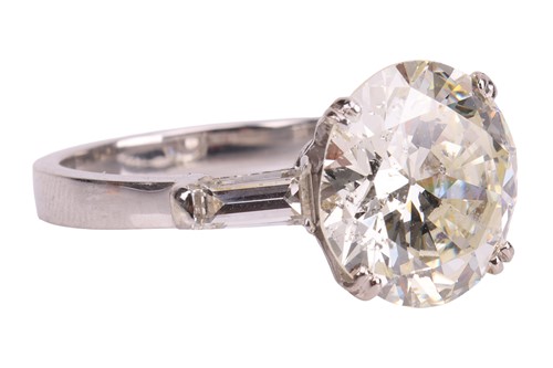 Lot A diamond solitaire ring, featuring a...