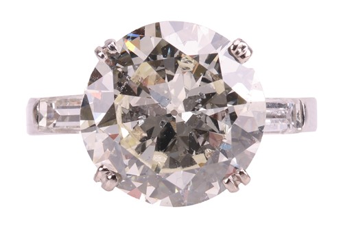 Lot A diamond solitaire ring, featuring a...