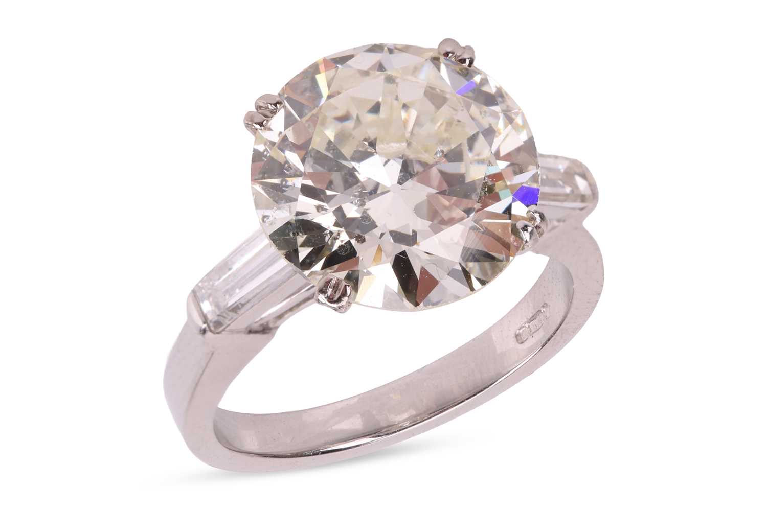 Lot A diamond solitaire ring, featuring a...