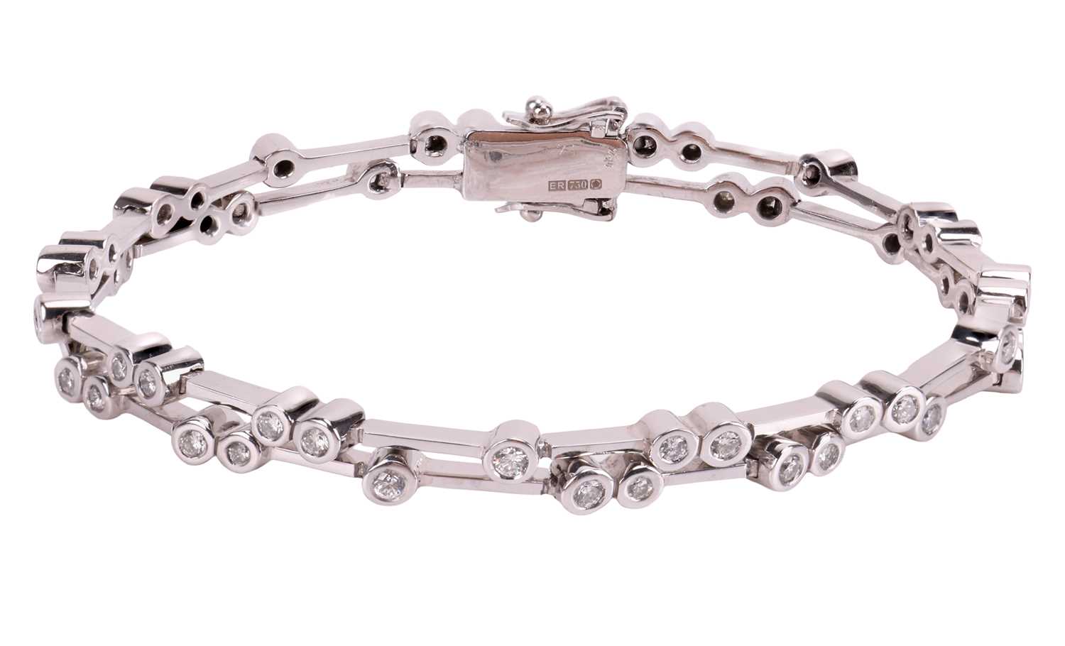 Lot 189 - A diamond-set bracelet, comprising two rows of...