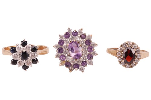 Lot 90 - Three 9ct gold gem-set cluster rings; The...