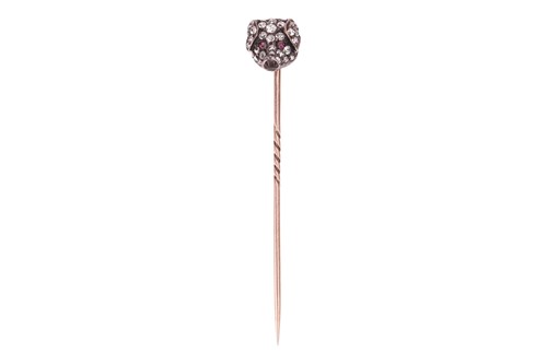 Lot 1 - A Victorian pig head stick pin, the sculpted...