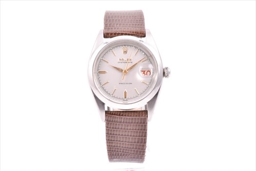 Lot 359 - A 1959 Rolex Oysterdate Precision ref. 6494...