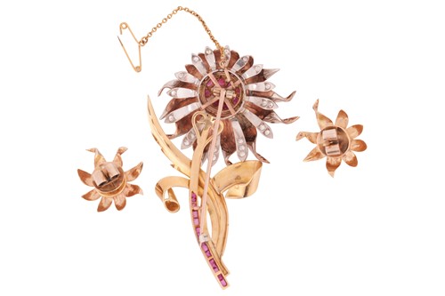 Lot 90 - A floral brooch and matching earrings set with...