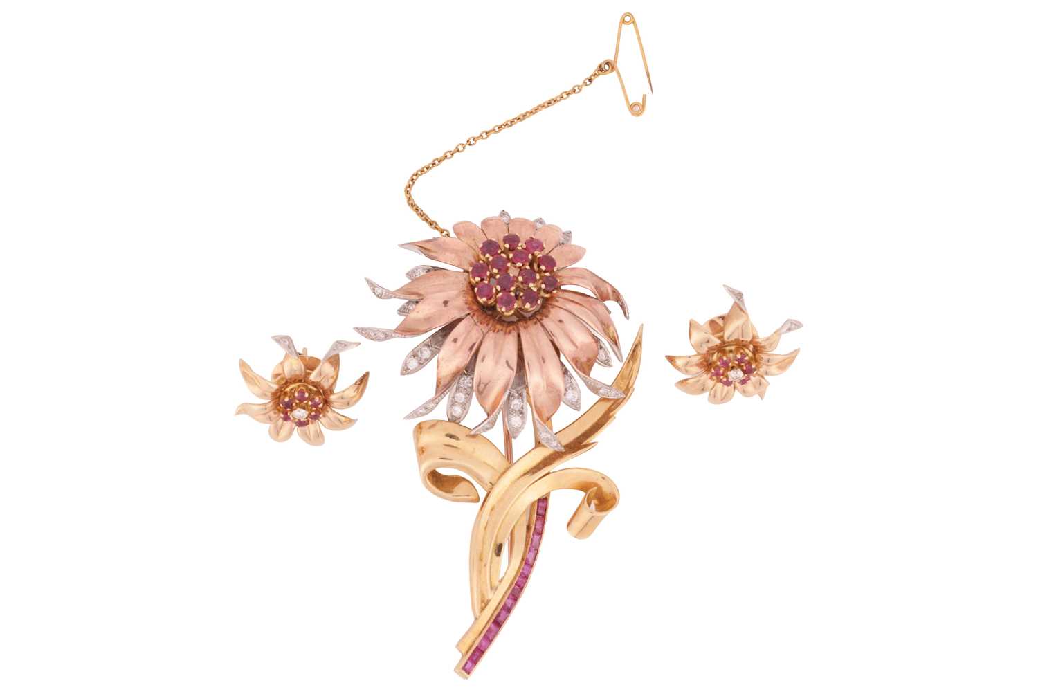 Lot 90 - A floral brooch and matching earrings set with...