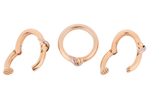 Lot 211 - Cartier - A trinity ring and clip earrings set;...
