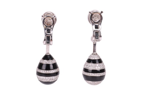 Lot 217 - Chanel - A pair of carved onyx and diamond...