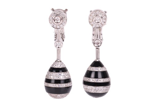 Lot 217 - Chanel - A pair of carved onyx and diamond...