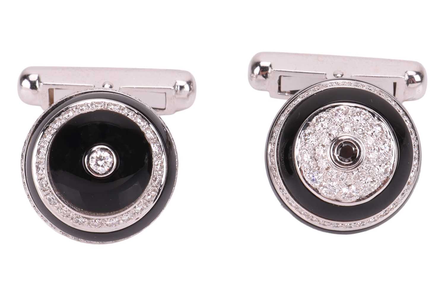Lot 216 - Chanel - A pair of carved onyx and diamond...