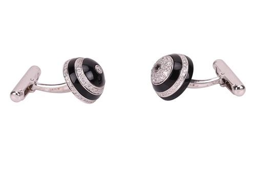 Lot 216 - Chanel - A pair of carved onyx and diamond...