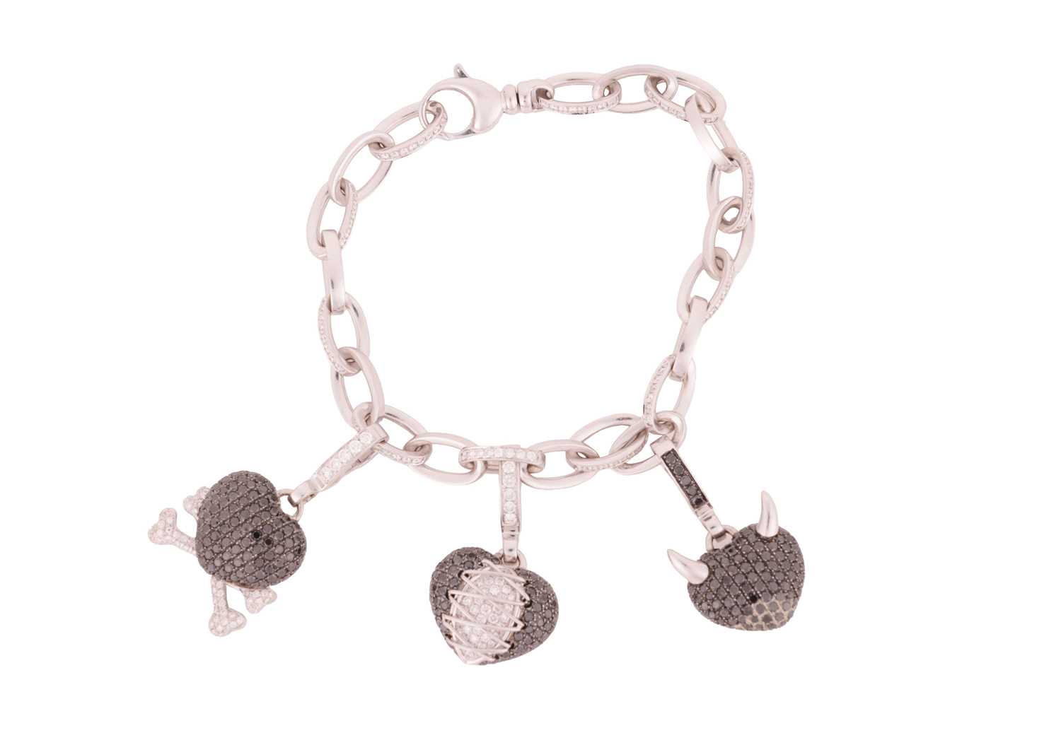 Lot 218 - Theo Fennell - A diamond-set 'Art' charm...