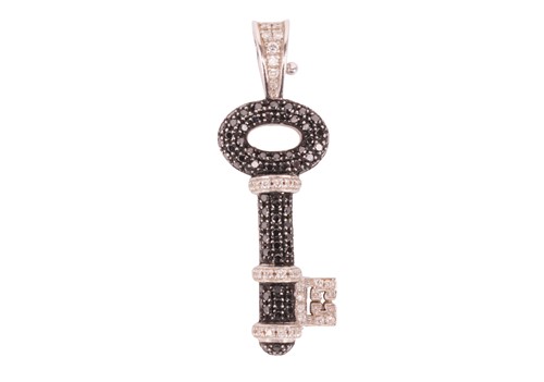 Lot 219 - Theo Fennell - A 'Diamond Skinny Baby Key'...