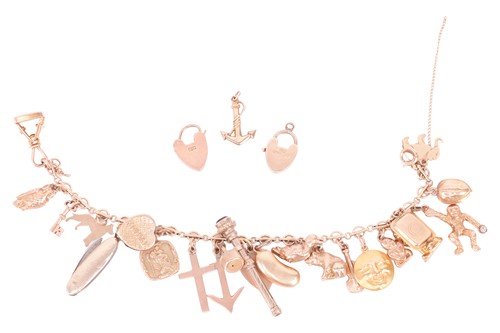 Lot 130 - A charm bracelet, to include a diamond-set...