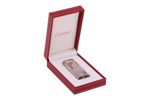 Lot 206 - Cartier - a ‘Trinity’ lighter, of overall...