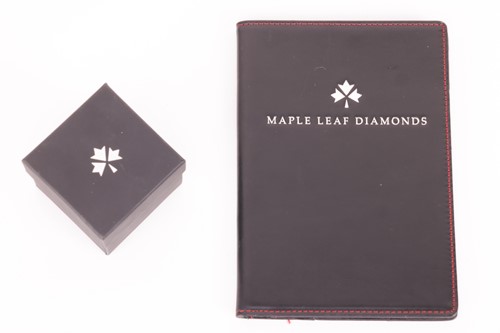 Lot 187 - A pear-cut diamond cluster ring, featuring a...