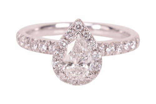 Lot 187 - A pear-cut diamond cluster ring, featuring a...