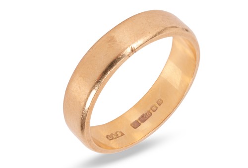 Lot 63 - A wedding band in 18ct yellow gold, the...