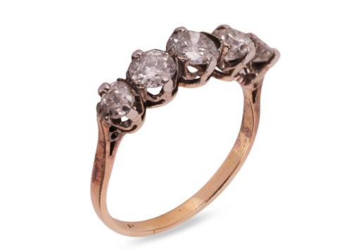 Lot 24 - A diamond five-stone ring, featuring five...
