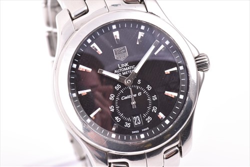 Lot 361 - A Tag Heuer Calibre 6 stainless steel...