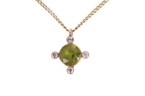 Lot 54 - A peridot and diamond pendant on chain,...