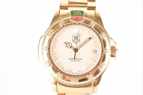 Lot 429 - A Tag Heuer Professional gold plated...