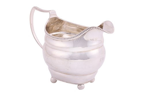 Lot A George III silver cream jug, London 1813,...