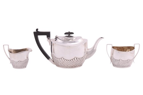 Lot A Victorian silver three-piece tea service,...