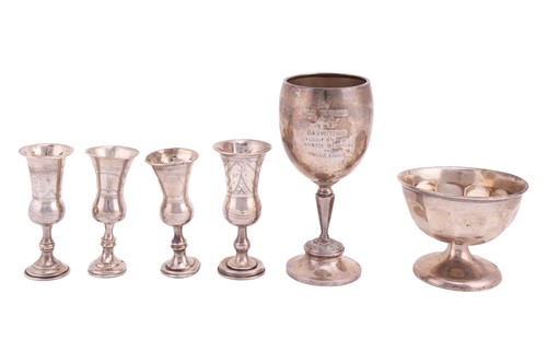 Lot 227 - Four matched silver kiddush cups, stemmed cups...