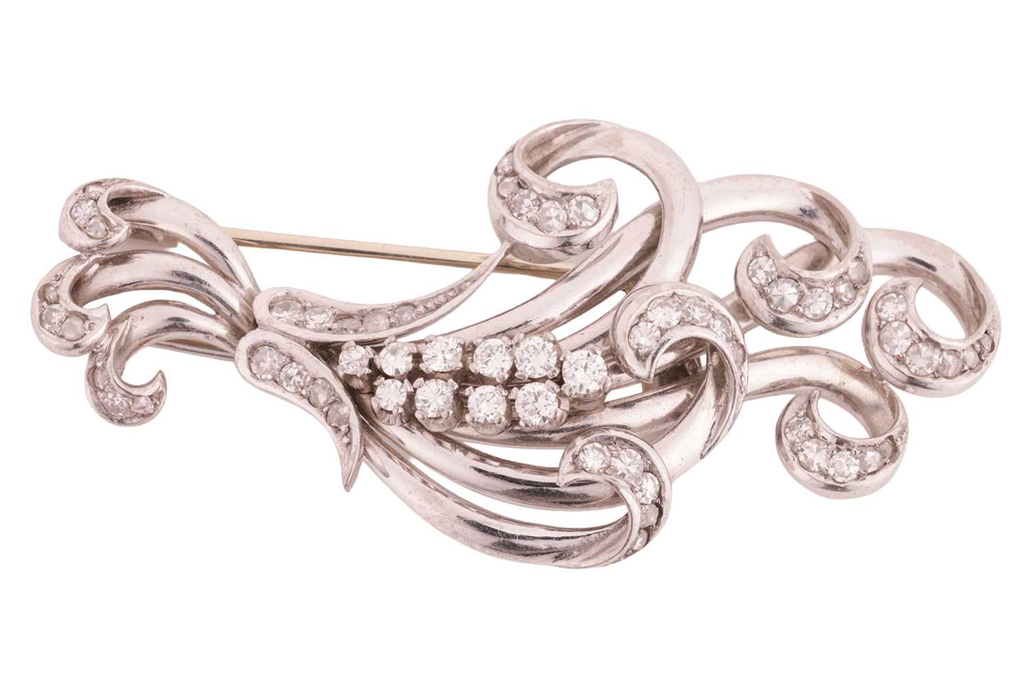 Lot 71 - A Mid-Century diamond-set spray clip brooch,...