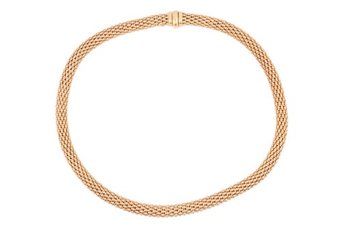 Lot 200 - A flexible tubular mesh necklace, composed of...
