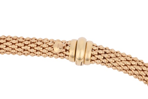 Lot 200 - A flexible tubular mesh necklace, composed of...