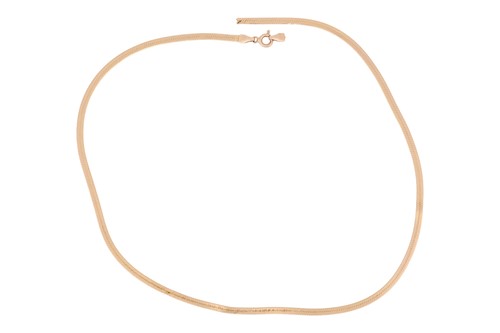 Lot 50 - A snake chain, in yellow metal stamped '9KT',...