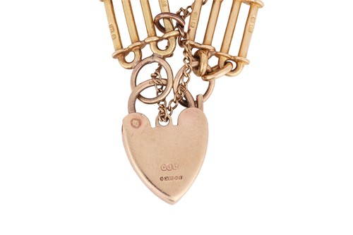 Lot 91 - A charm bracelet, the three-bar gate link...