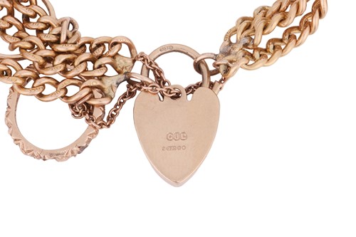 Lot 89 - A charm bracelet, the triple row flat...