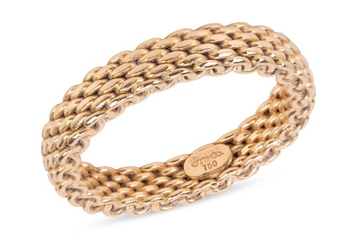 Lot 209 - Tiffany & Co. - An 18ct gold ‘Somerset’ mesh...