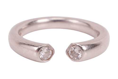 Lot A torque-style diamond-set ring, the platinum...
