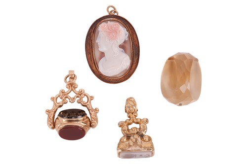 Lot Three fobs and a cameo pendant, the resin...