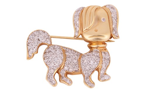 Lot A diamond set dog brooch, set with round...