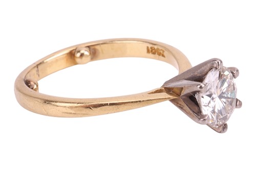 Lot A diamond solitaire ring, featuring a round...