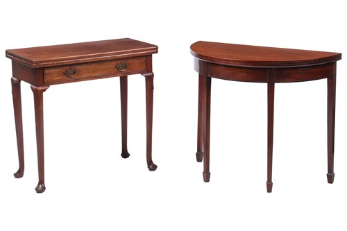 Lot 26 - A George II mahogany foldover tea table with...