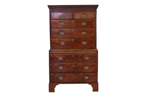 Lot 32 - A George III mahogany chest on chest, dentil...